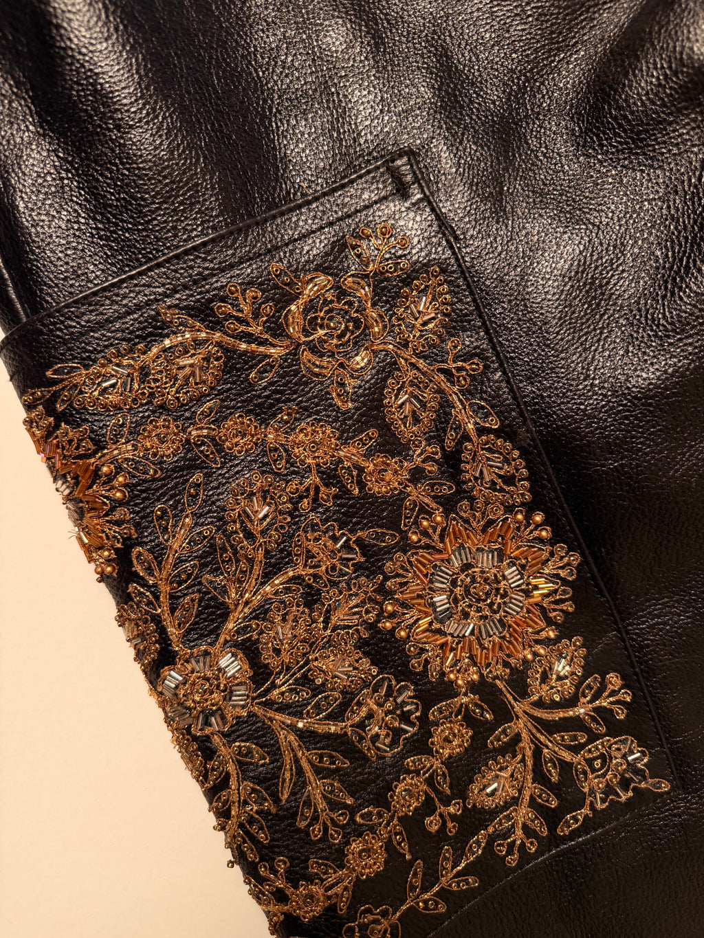Gold embroidered leather pants