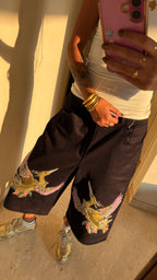 diya bicep pakshi tattoo shorts