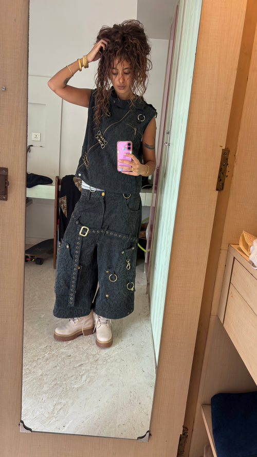 block print denim jorts wit gold things on dem